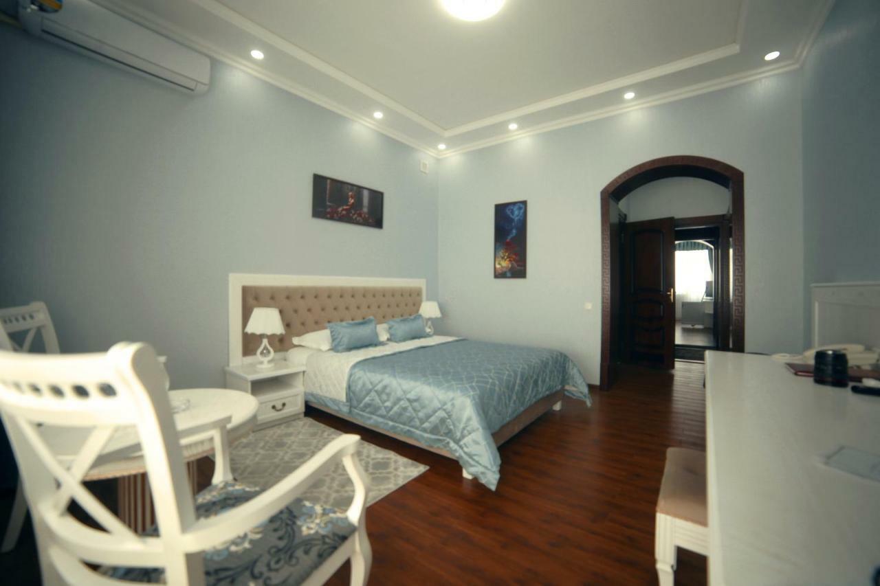 Bravolyuks Hotel Ургенч Экстерьер фото