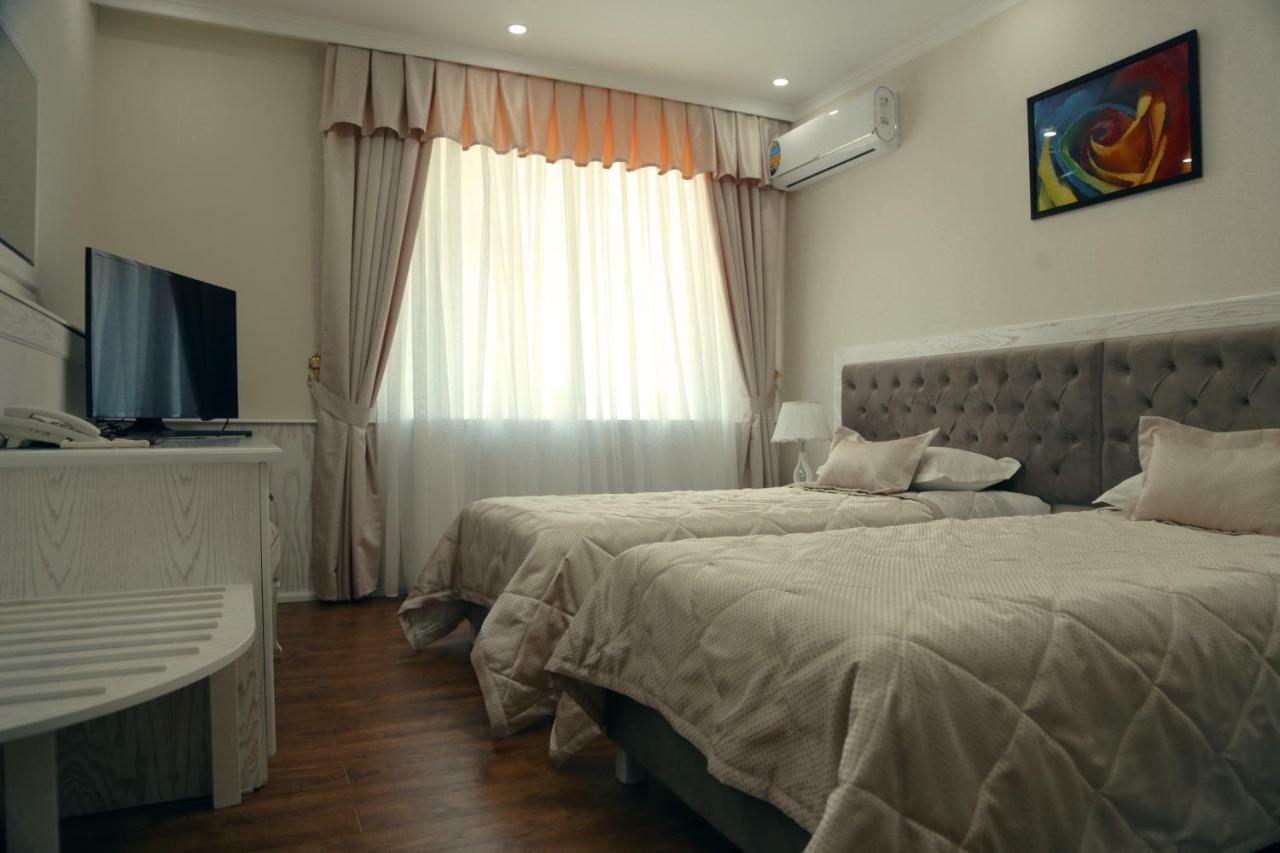 Bravolyuks Hotel Ургенч Экстерьер фото