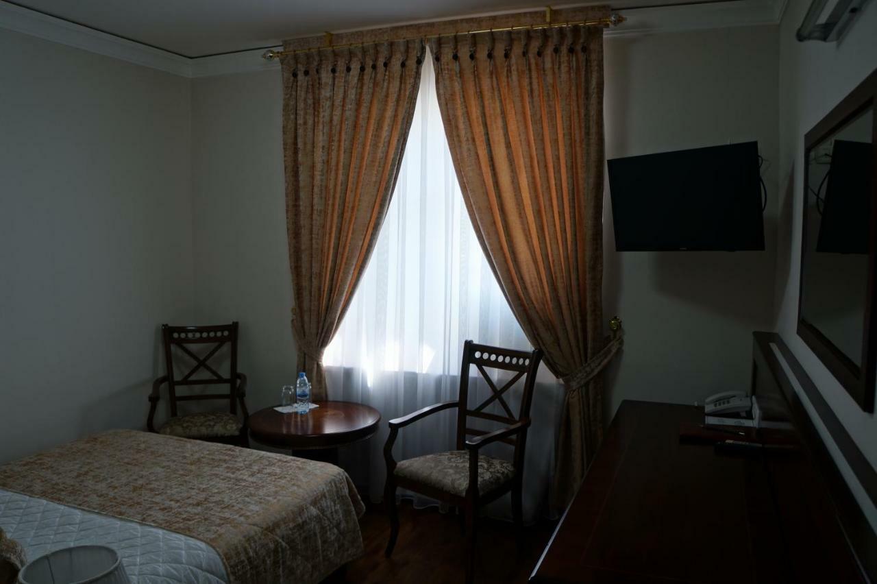 Bravolyuks Hotel Ургенч Экстерьер фото
