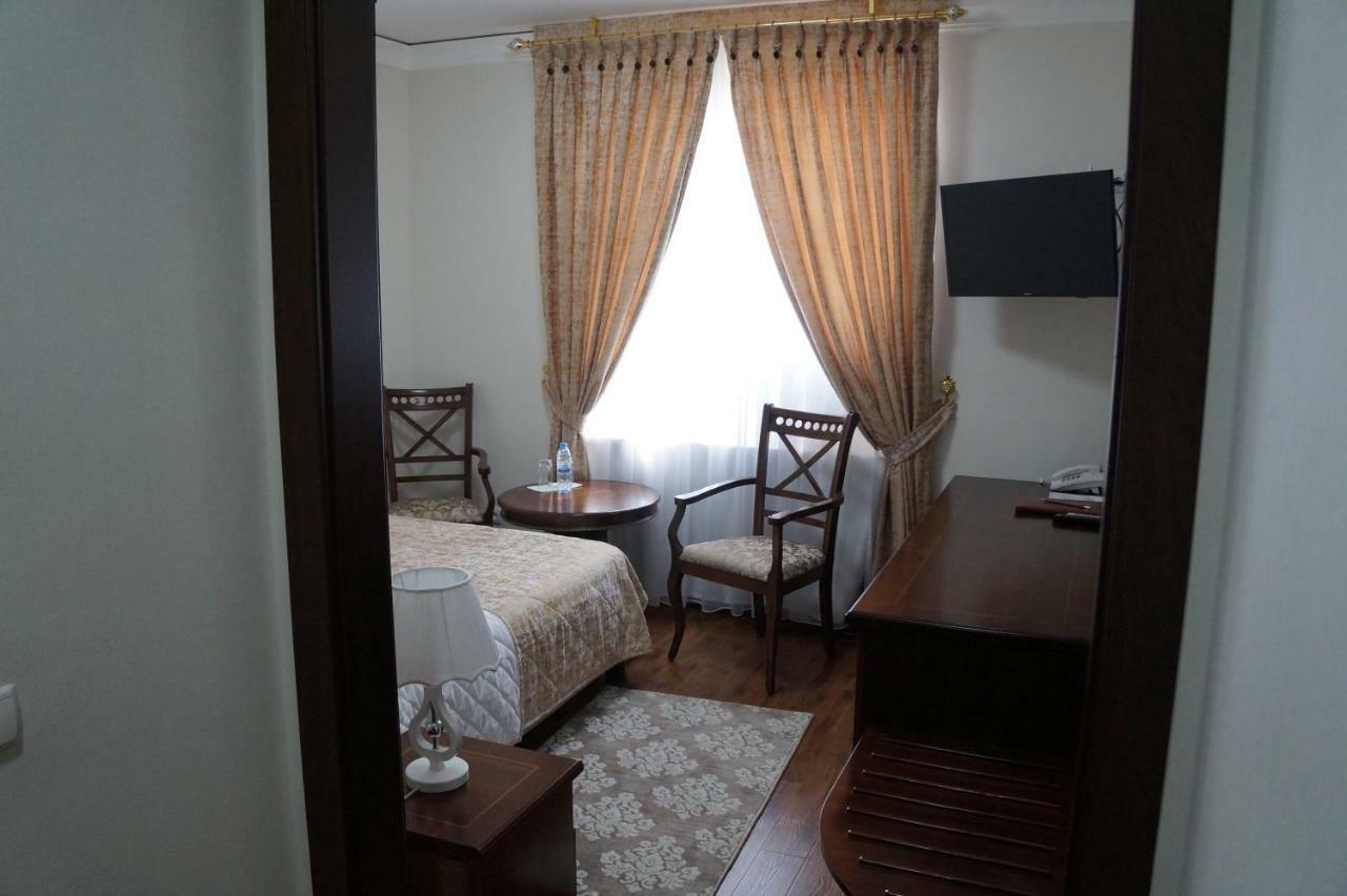 Bravolyuks Hotel Ургенч Экстерьер фото